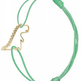 Mint green cord bracelet with gold dinosaur shaped pendant