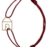 Burgundy cord bracelet with gold house shaped pendant with small diamond